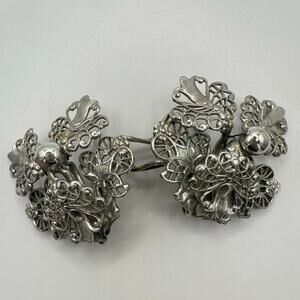 Judith McCann 1940s vintage silver tone floral flowers wingback clip earrings